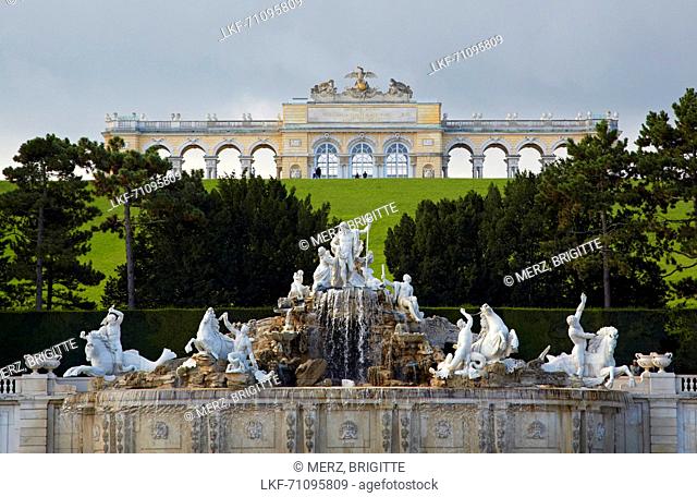 Park of Sch÷nbrunn Castle with well Neptunbrunnen and Gloriette at Vienna on the river Danube , Austria , Europe