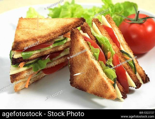 FAST FOOD, CLUB SANDWICH WITH LETTUCE AND TOMATO