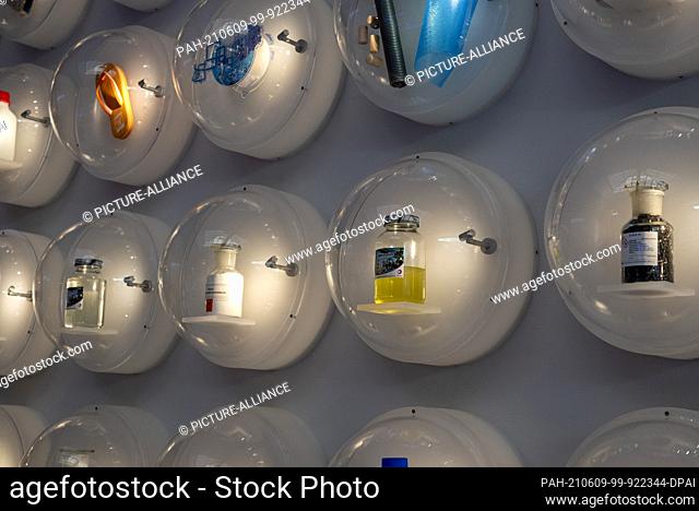 02 June 2021, Saxony-Anhalt, Leuna: In a visitors' room at Infraleuna GmbH, products from the chemical industry are on display