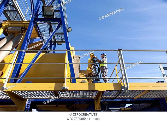 Man working onboard a ship