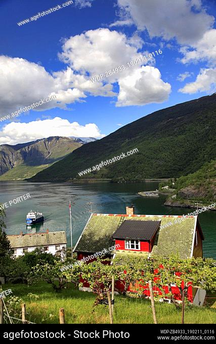 View of a house and the mountains surrounding the town of Flam, Aurlandsfjorden Fjord, Sogn Og Fjordane region of Norway, Scandinavia, Europe
