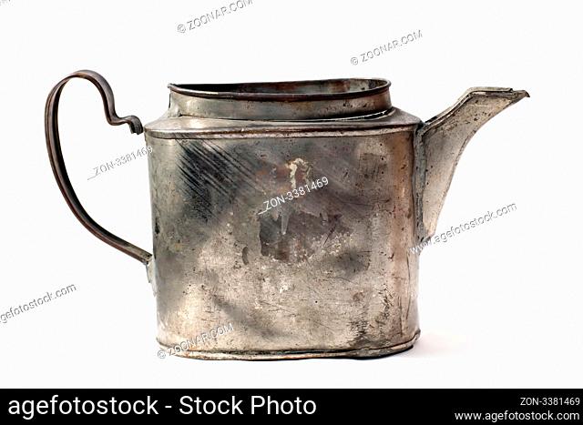 retro kettle with scratches on the white background