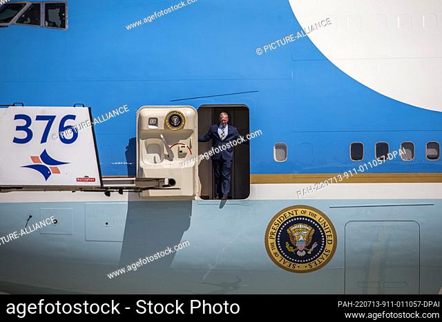 13 July 2022, Israel, Lod: A US security member opens the door of Air Force One upon landing with US President Joe Biden at Ben Gurion Airport for a state visit...