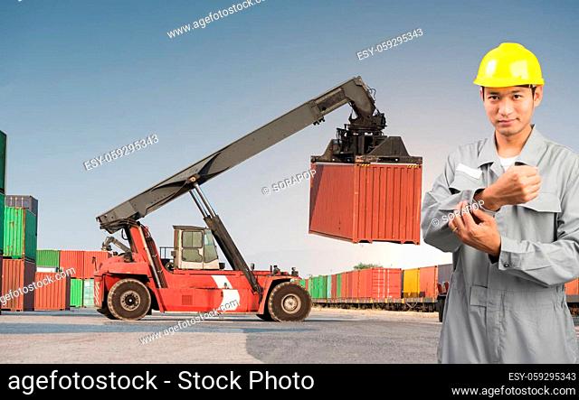 Foreman stand on front forklift loading Containers box to Logistic cargo Import Export
