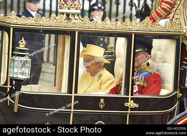 Queen Elizabeth II Prince Philip, Duke of Edinburgh ride in a carriage procession to Buckingham Palace following the marriage of Their Royal Highnesses Prince...