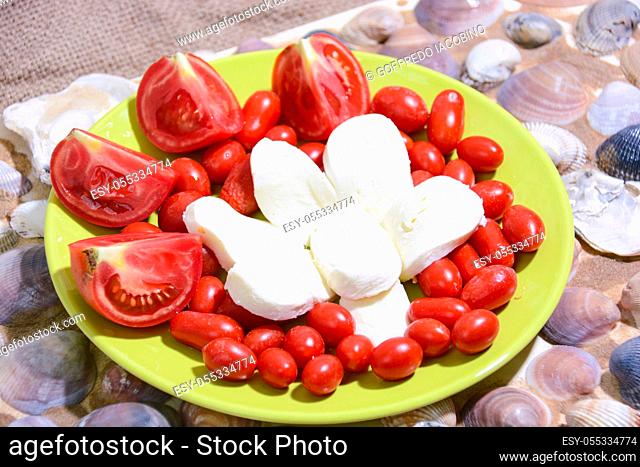 italian healthy food: mozzarella tomatoes bread oil and oregano
