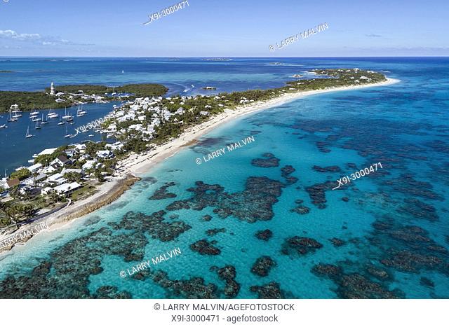 Aerial view of the harbour, lighthouse and beach in Hope Town on Elbow Cay off the island of Abaco, Bahamas