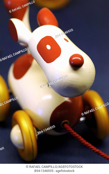 Toy. Small wooden dog on wheels. Vinçon store. Barcelona. Catalonia. Spain