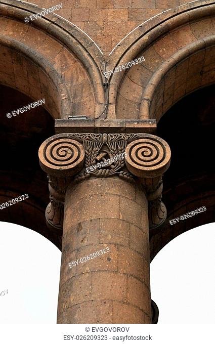 Columns with capitals of the central railway station in Armenia. Soviet symbols