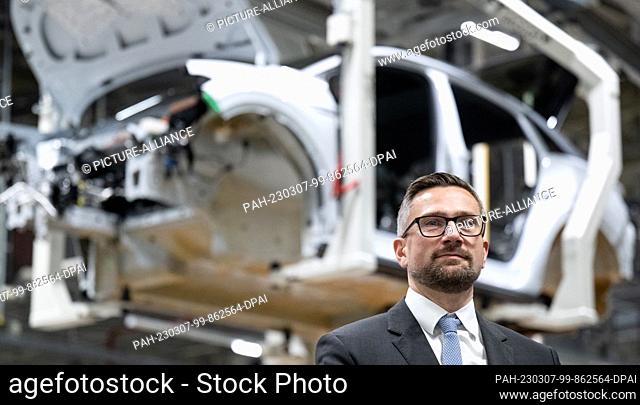 23 February 2023, Saxony, Zwickau: Martin Dulig (SPD), Minister of Economics in Saxony, stands in the Volkswagen plant in Zwickau