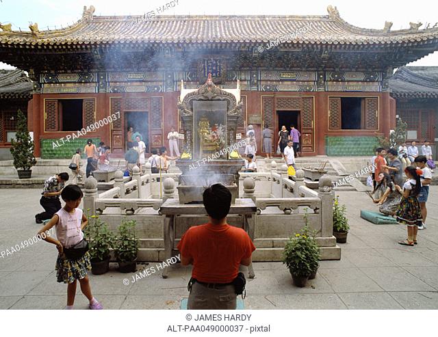 China, Beijing, people in front of temple