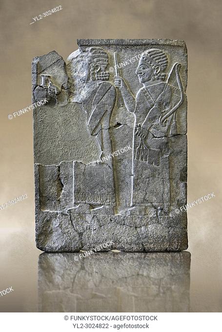 Relief panels Orthostats with representation from court officials de front a vessel, the second supporting arms. Found in North Hall of Sam'al - Zincirli