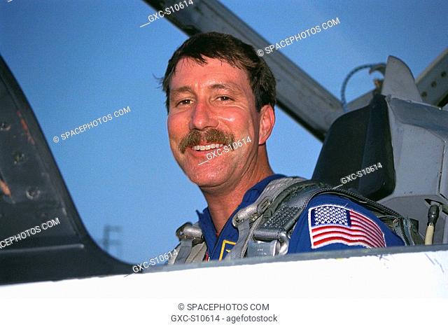 07/20/1997 --- STS-85 Pilot Kent V. Rominger poses in his T-38 jet trainer after landing with other members of the flight crew at KSC’s Shuttle Landing Facility...
