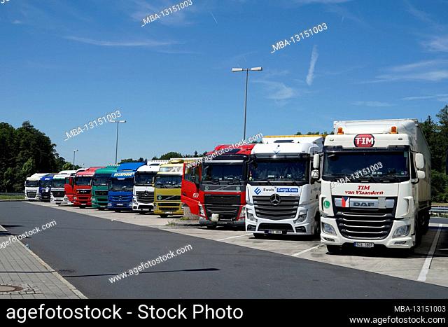 Germany, Hessen, Frankfurt, A3, Autobahn rest area, truck parking lot, trucks parked next to each other