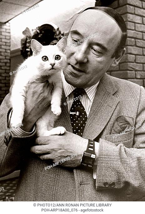 Desmond Morris with a burmilla cat at Dumfries, Scotland, for THE ANIMALS ROADSHOW BBC TV programme. 1986.
