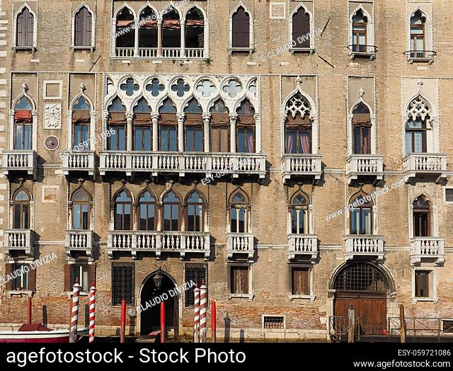 Ancient traditional house facade in Venice, Italy