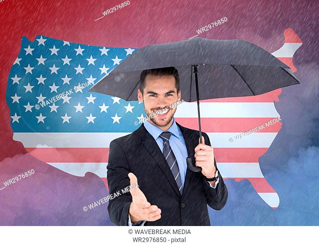 Business man holding umbrella and shaking his hands against 3d american flag