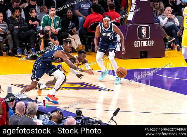 12 January 2023, US, Los Angeles: Basketball: NBA, Main Round, Los Angeles Lakers - Dallas Mavericks. National basketball player Dennis Schröder (M) of the Los...