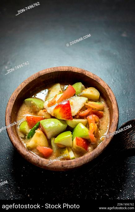 Thai food spicy fruit salad on black table background