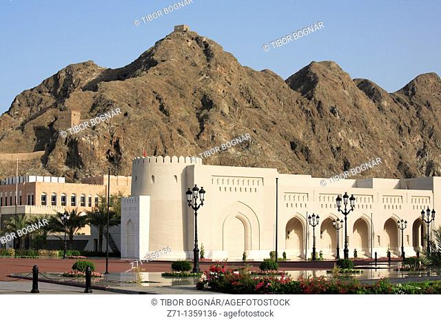 Government buildings colonnade, mountain scenery, Muscat, Oman