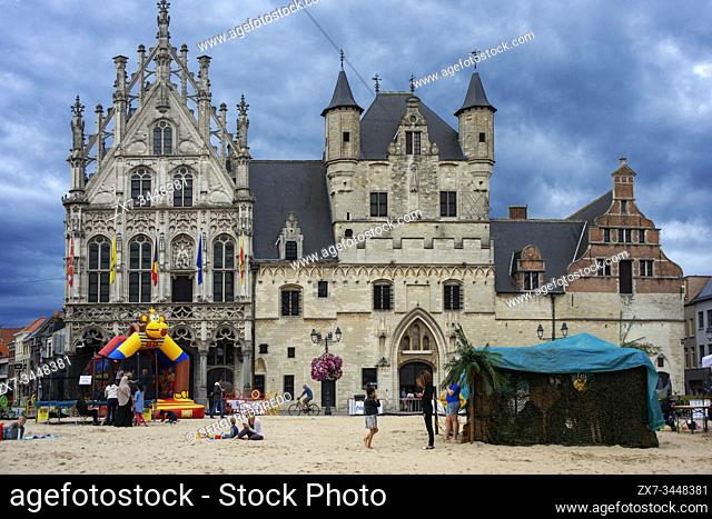 Artificial sand beach in front of Guild houses and City Hall in Mechelen main square, Grote Markt, Belgium