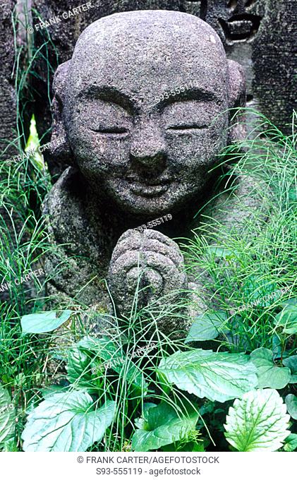 Stone figure, one of hundreds at Atago Nembutsu-Ji, just north of Atago Torii. Sagano. Kyoto. Japan