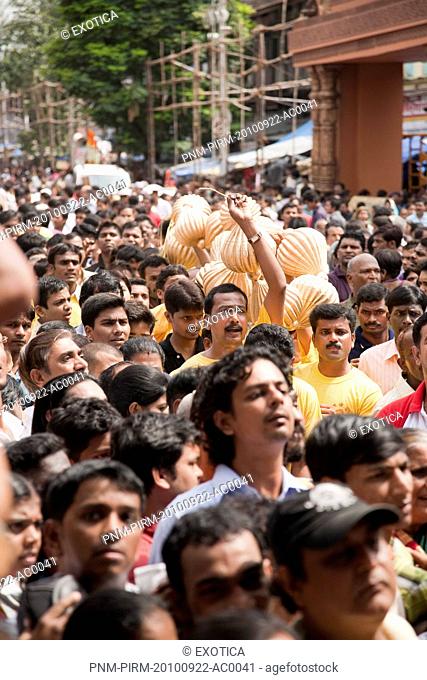 Crowd at a religious procession during Ganpati visarjan ceremony, Mumbai, Maharashtra, India
