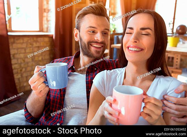 happy young couple relax at modern home living room indoor. Couple in love - Beginning of a Love Story