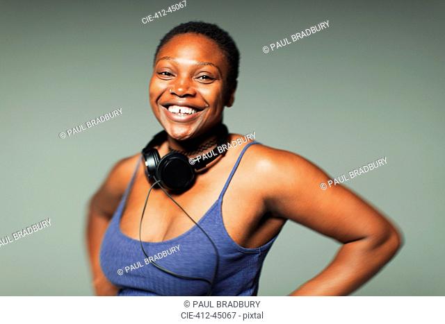 Portrait smiling, confident woman with headphones