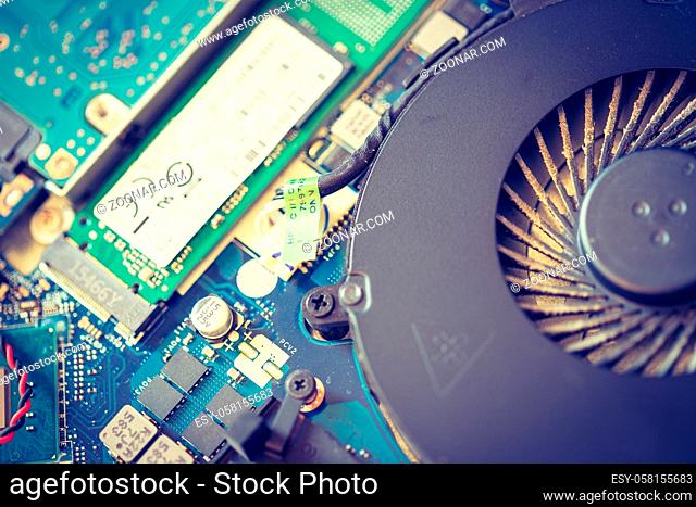 Computer cooling fan for overclocking on a circuit board, close up; Computer technology