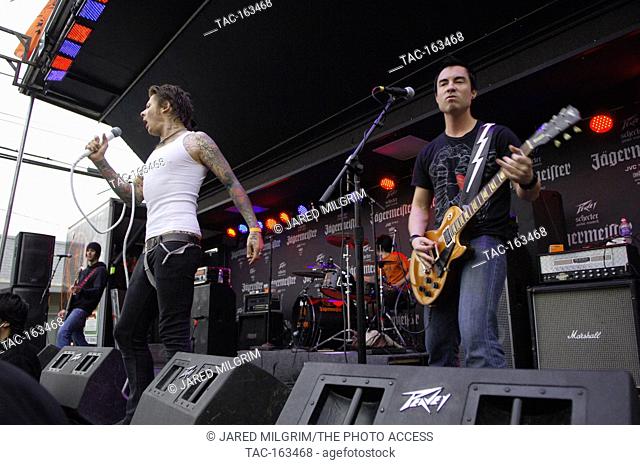 (L-R) Brent Clawson, Gene Louis, Ty Smith, Kevin Tapia of Bullets & Octane performing on the Jagermeister Music Tour Stage at the Nine Star Holiday Handrail in...