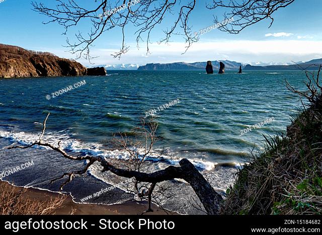 Beautiful Kamchatka Peninsula seascape: view of rocky islands in sea - Three Brothers Rocks in Avacha Bay (Avachinskaya Bay) in Pacific Ocean