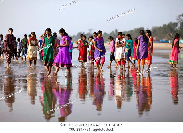girls in colourful Saris on the City Beach at Gokarna, Karnataka, India, Asia