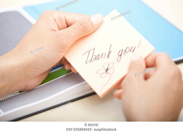 Thank you text on adhesive note