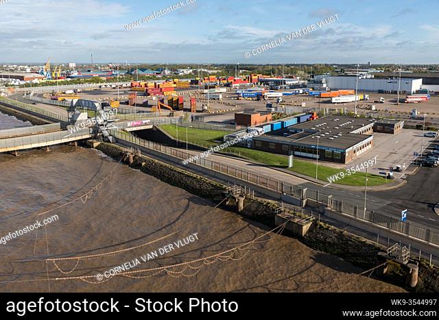 KINGSTON UPON HULL, ENGLAND, UNITED KINGDOM - MAY 6, 2015: Trucks arrive in the UK from the ferry at the North Sea Ferries Terminal, King George Dock