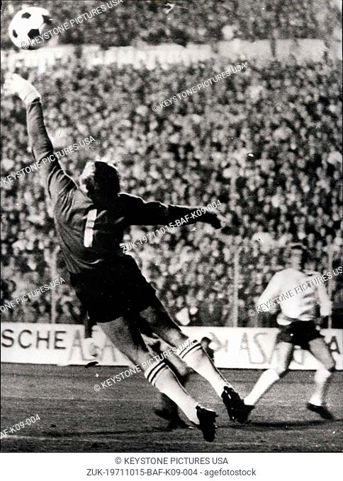 Oct. 15, 1971 - England beat Switzerland: Photo shows Switzerland's goalkeeper Kunz is beaten by a ball from England's Martin Chivers (background)
