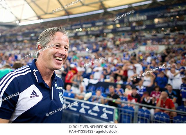 Schalke's head coach Jens Keller arrives for the farewell match for Raul betweeen FC Schalke 04 and Al-Sadd at Veltins Arena in Gelsenkirchen, Germany