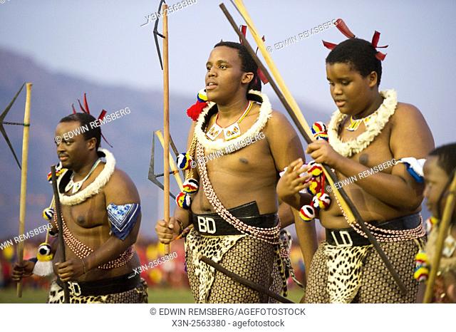Ludzidzini, Swaziland, Africa - Umhlanga, reed dance ceremony. Maidens dance before King Mswati III on day 7 of the ceremony