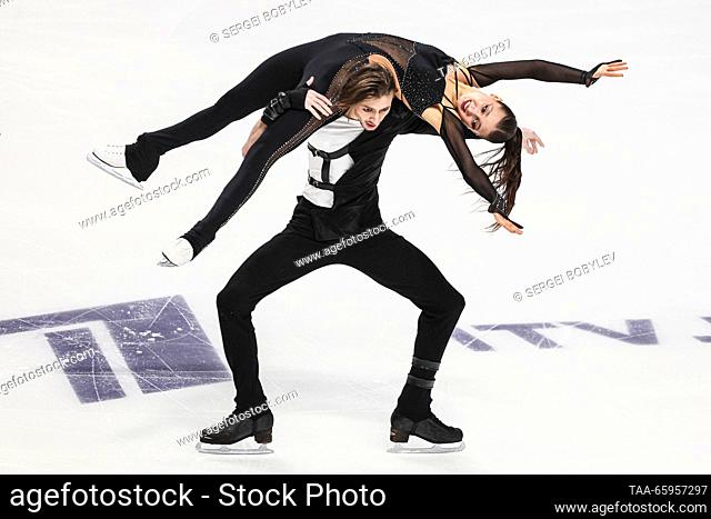 RUSSIA, CHELYABINSK - DECEMBER 21, 2023: Ice dancers Irina Khavronina and Devid Naryzhnyy perform their rhythm dance during the ice dance event of the 2024...