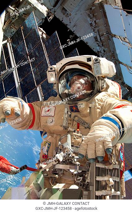 Russian cosmonaut Fyodor Yurchikhin, Expedition 36 flight engineer, participates in a session of extravehicular activity (EVA) as work continues on the...