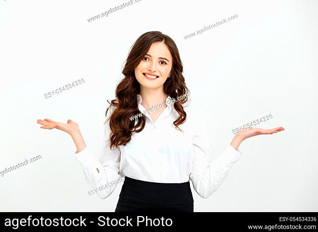 Business woman happy and surprise showing product .Beautiful girl holding hand to the side