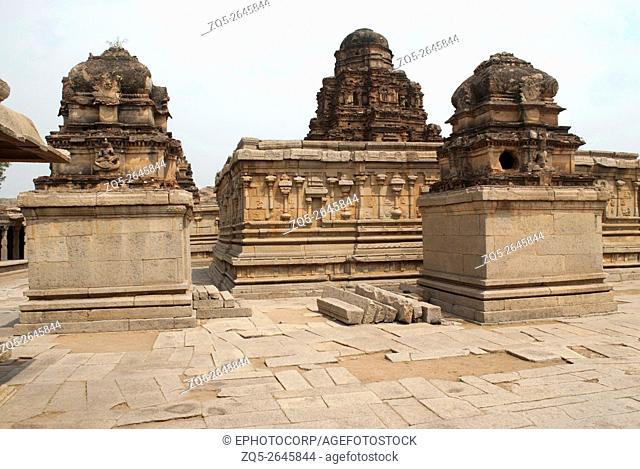 The Subrahmanya shrine on the left, the main sanctum in the centre and another shrine on the left side, Krishna Temple, Hampi, Karnataka, India