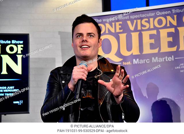 31 October 2019, North Rhine-Westphalia, Cologne: The musician Marc Martel plays and sings at the press conference for the tour of the show One Vision of Queen...