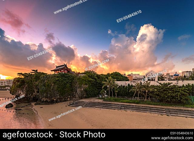Sunrise landscape of the Shinto Shrine Naminoue at the top of a cliff overlooking the beach and ocean of Naha in Okinawa Prefecture, Japan