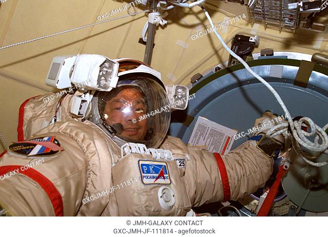 Astronaut Leroy Chiao, Expedition 10 commander and NASA ISS science officer, attired in his Russian Orlan spacesuit, participates in extravehicular activity...