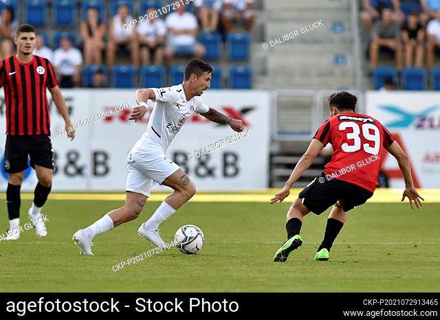 From left Milan Petrzela of Slovacko and Parvizchon Umarboev of Lokomotiv in action during the UEFA Europa Conference League