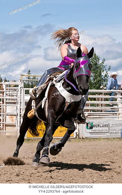 Female trick rider, Caroline Stampede, rodeo, Caroline, Alberta, Canada