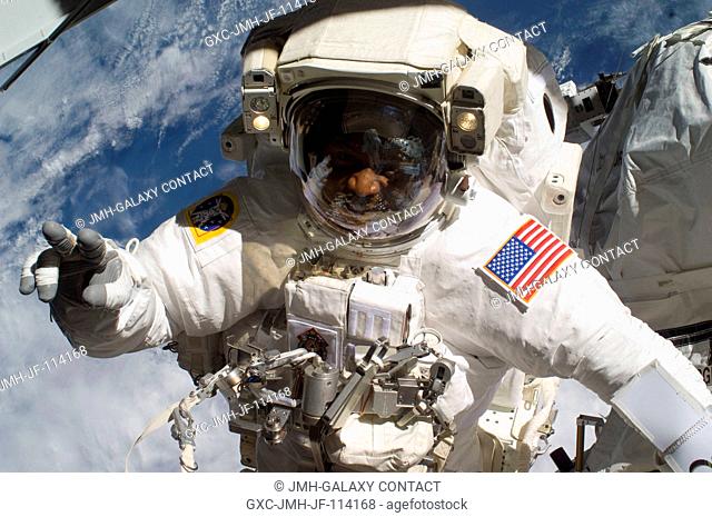 Astronaut Robert L. Satcher Jr., STS-129 mission specialist, participates in the mission's third and final session of extravehicular activity (EVA) as...