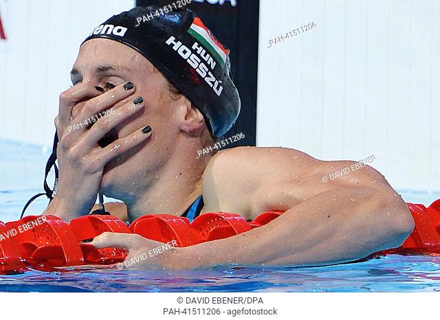 Katinka Hosszu of Hungary reacts after winning the women's 400m Individual Medley final of the swimming event of the 15th FINA Swimming World Championships at...