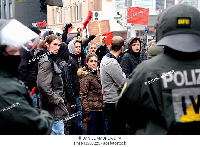 Police forces bottle up a group of left wing counterprotestors in Göppingen, Germany, 12 October 2013. According to police statements about 100 neo-Nazis have...